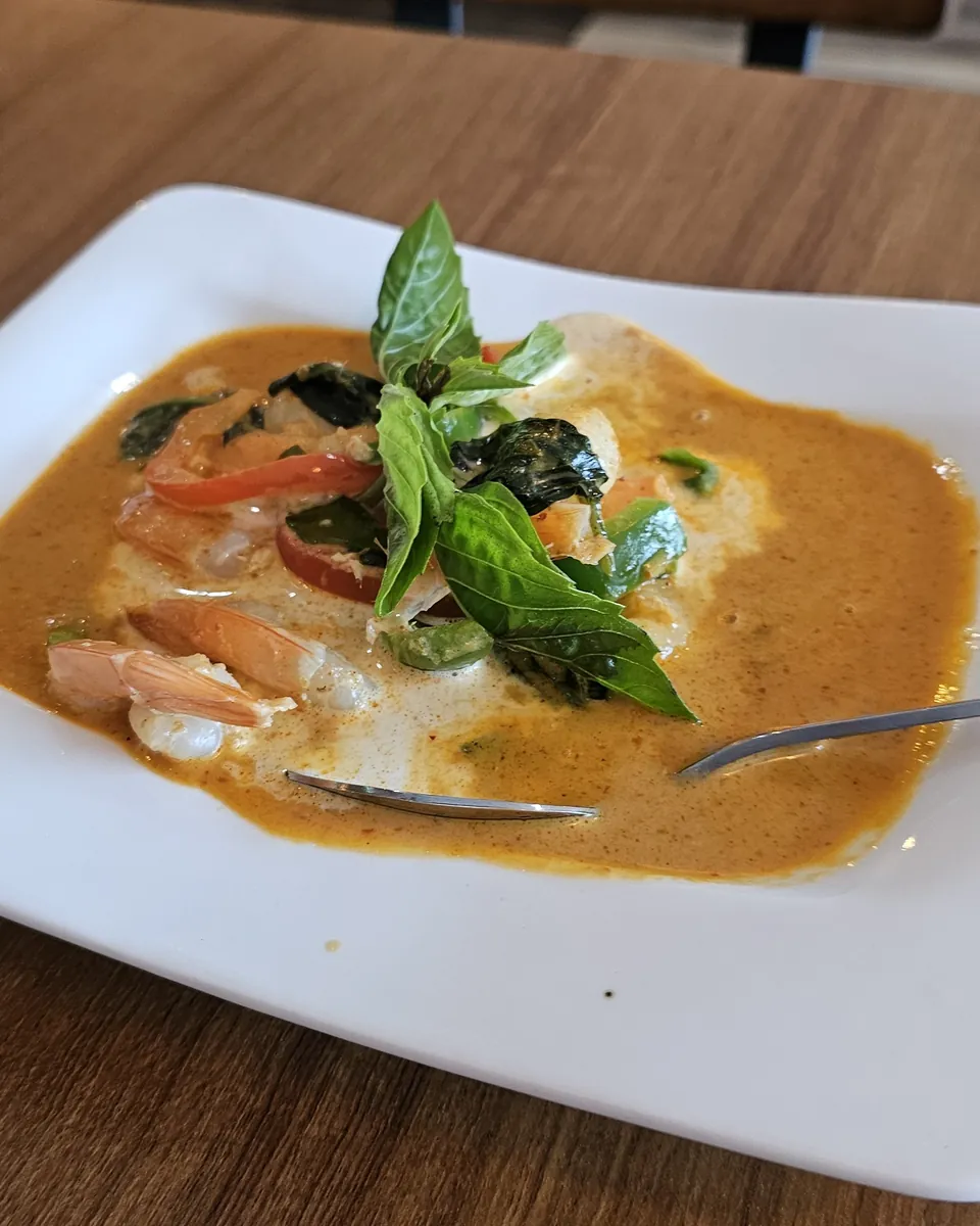Thai curry · before, unedited phone photo